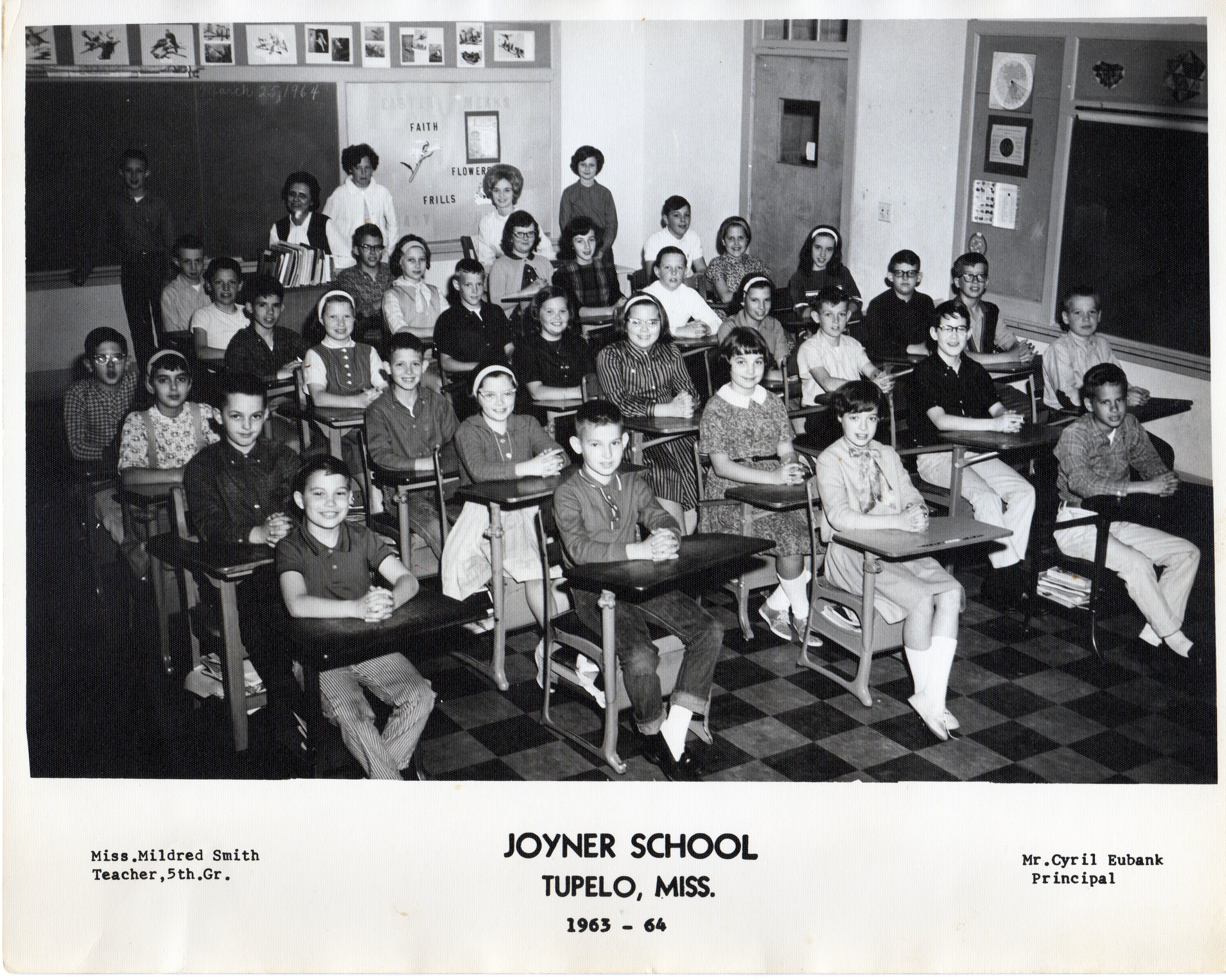 A group of people sitting in chairs